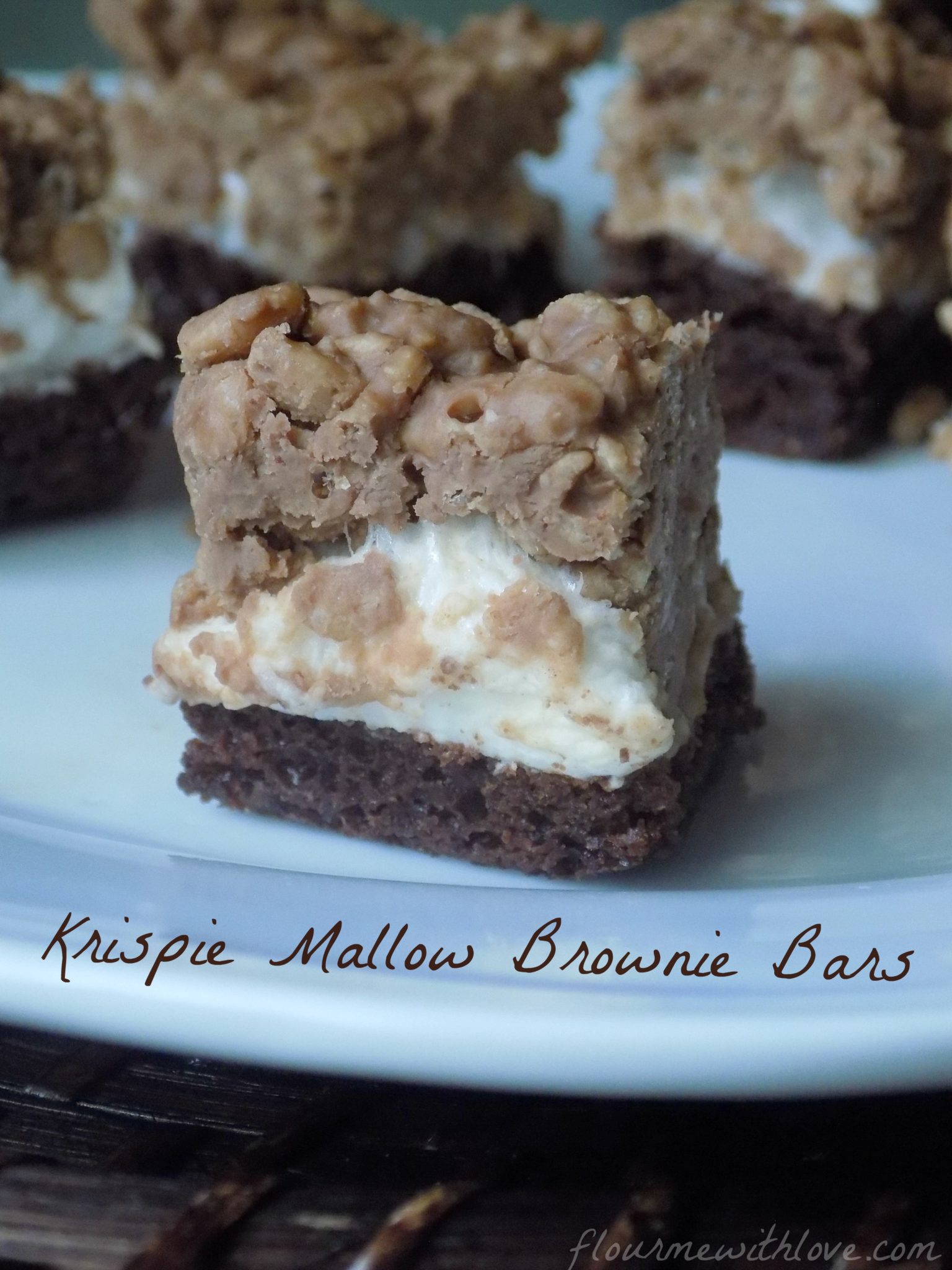 Layers of peanut butter krispie cereal, creamy marshmallows and chewy rich brownies make the perfect bar!
